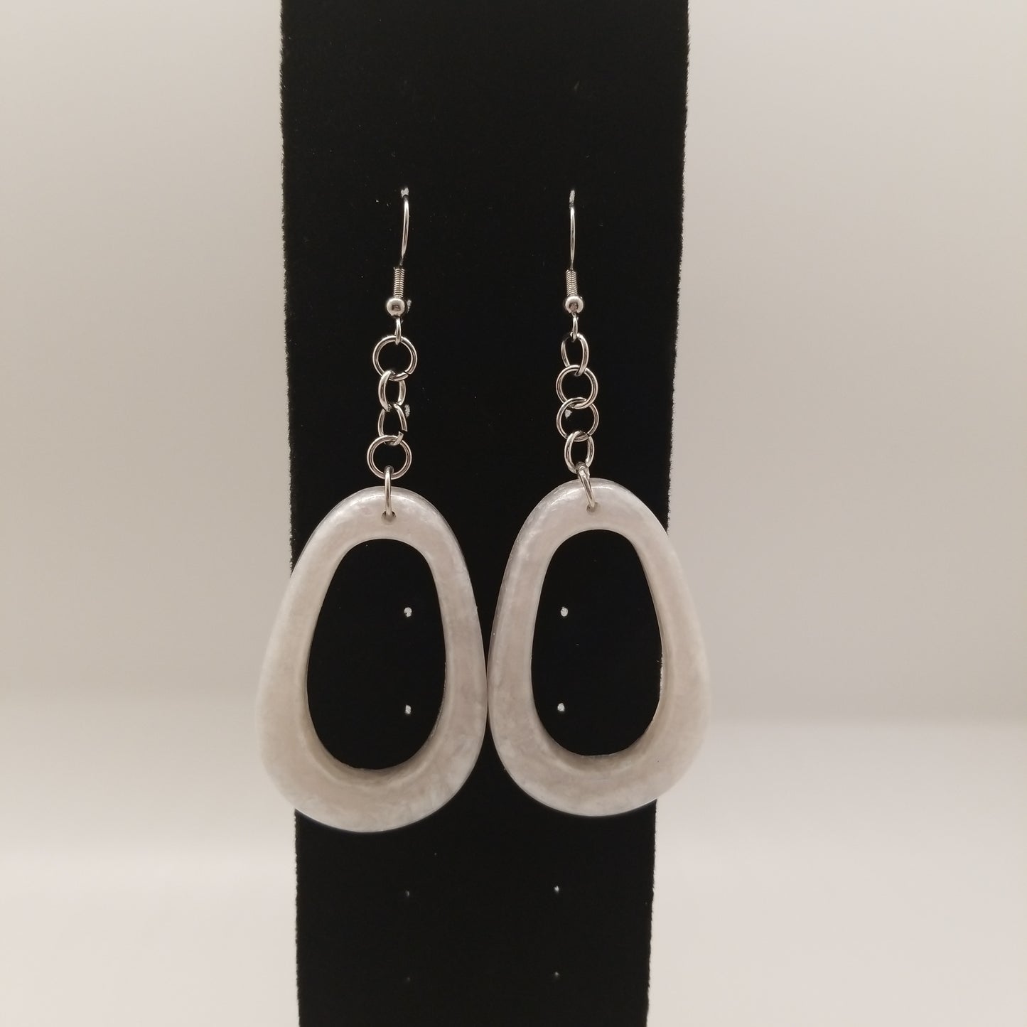 White oval earrings