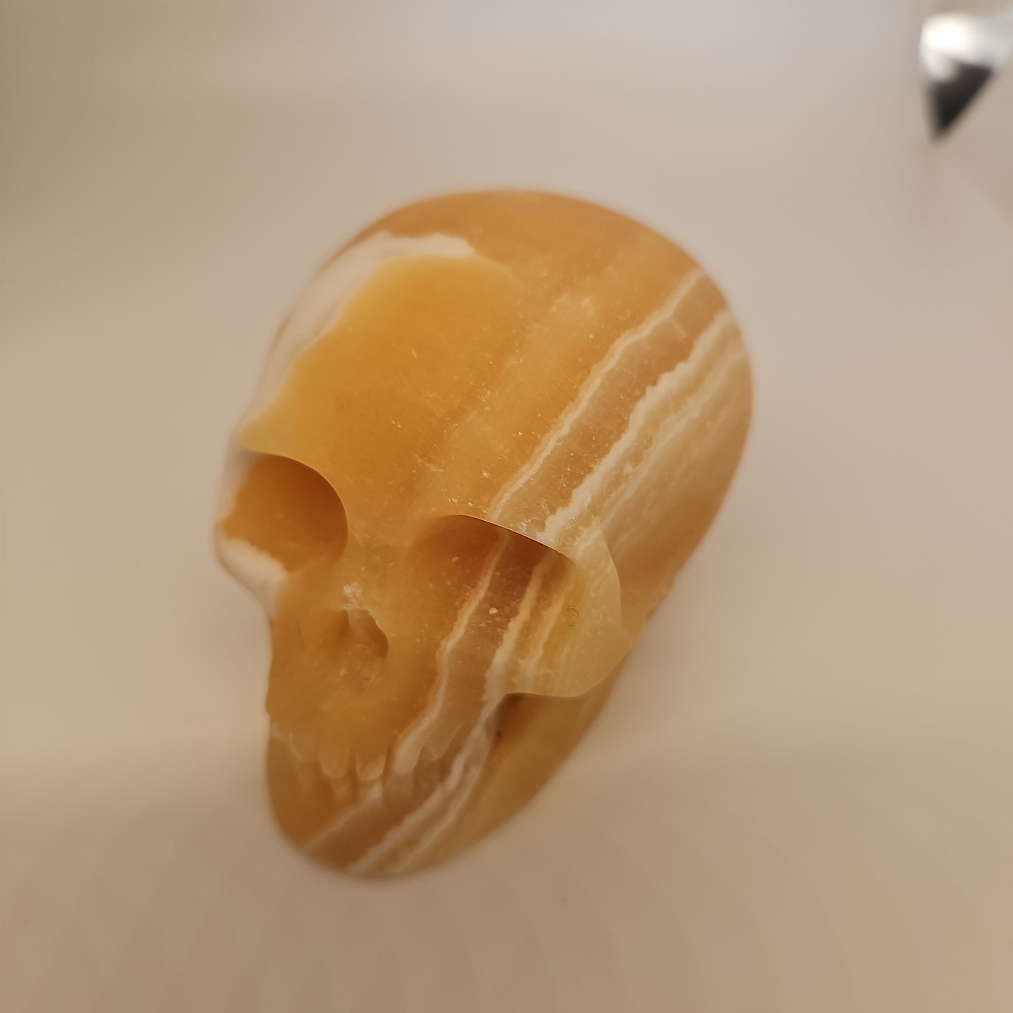 Yellow calcite skull