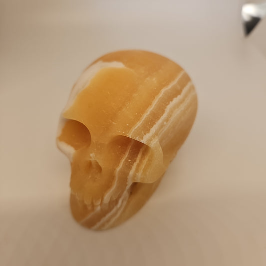 Yellow calcite skull
